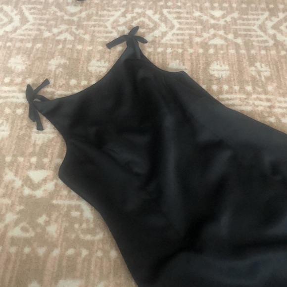 En francais by Huey waltzer vintage black slip dress with bow size 6
